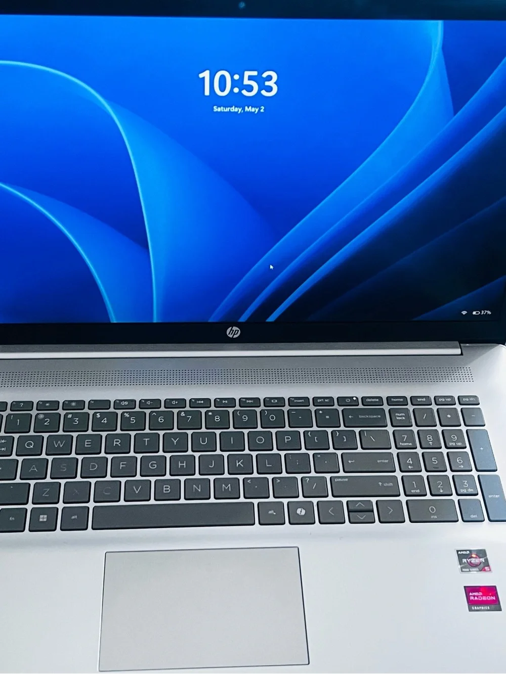 HP Silver Laptop with Blue Display and Dark Gray Keycaps